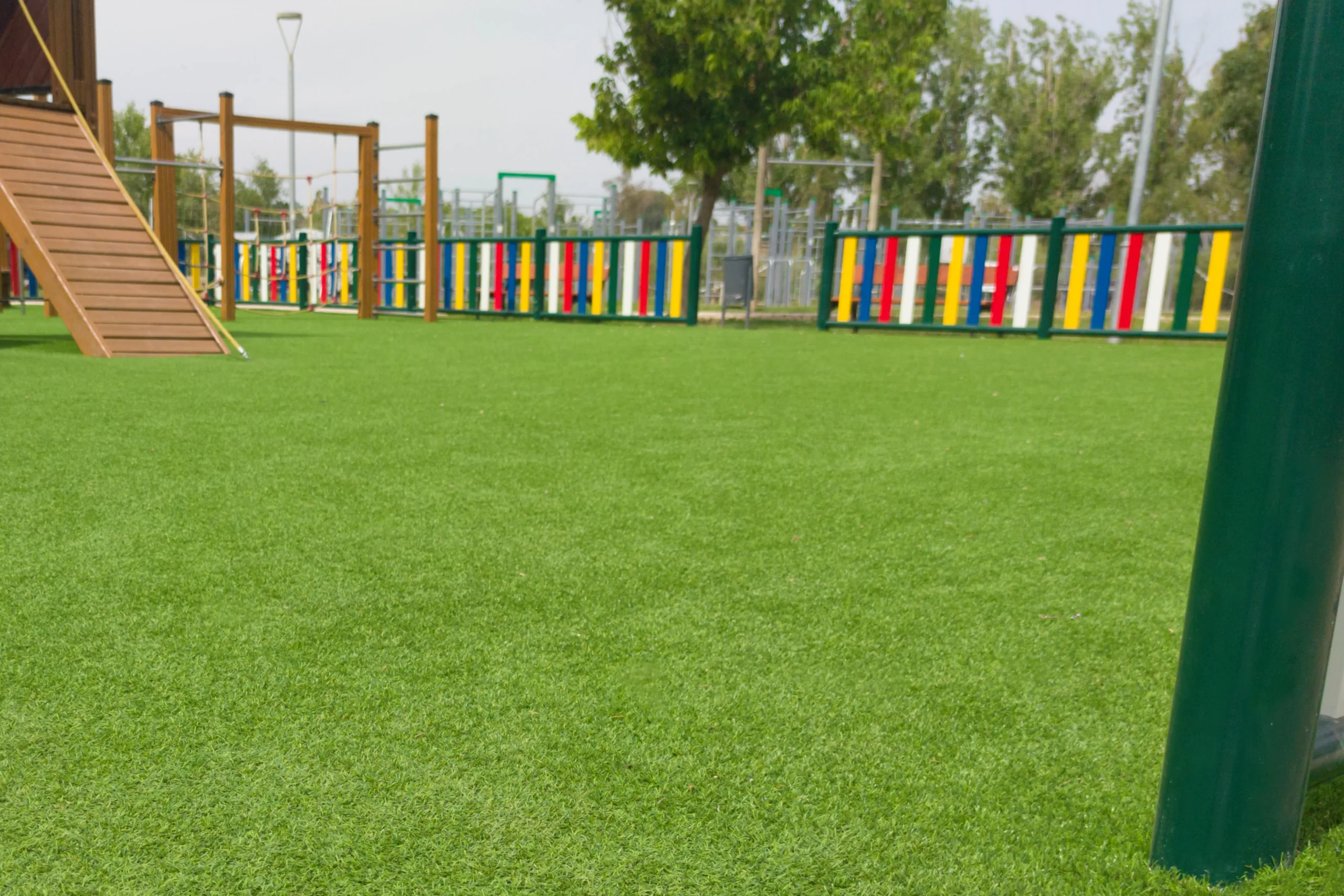 Playground with green artificial grass