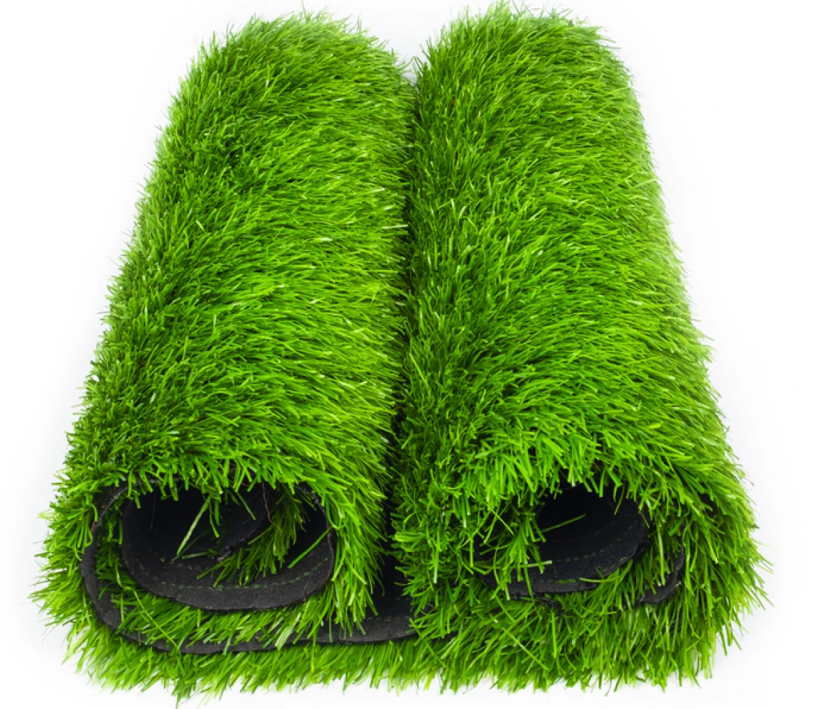 Artificial grass rolls on white background